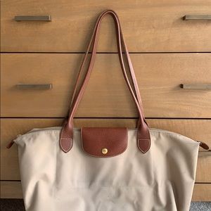 Tan long champ bag